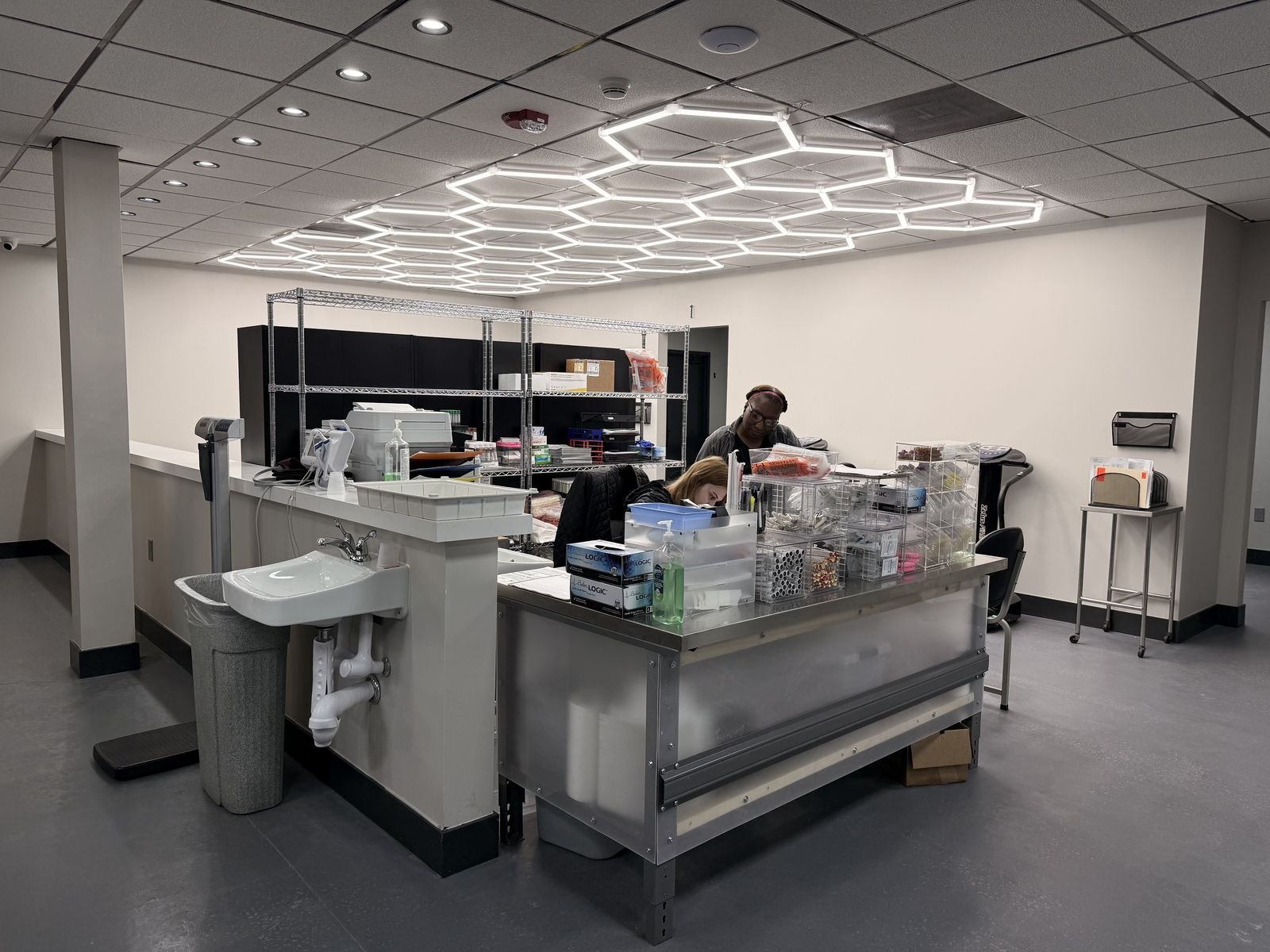 On-site laboratory draw station with staff preparing samples